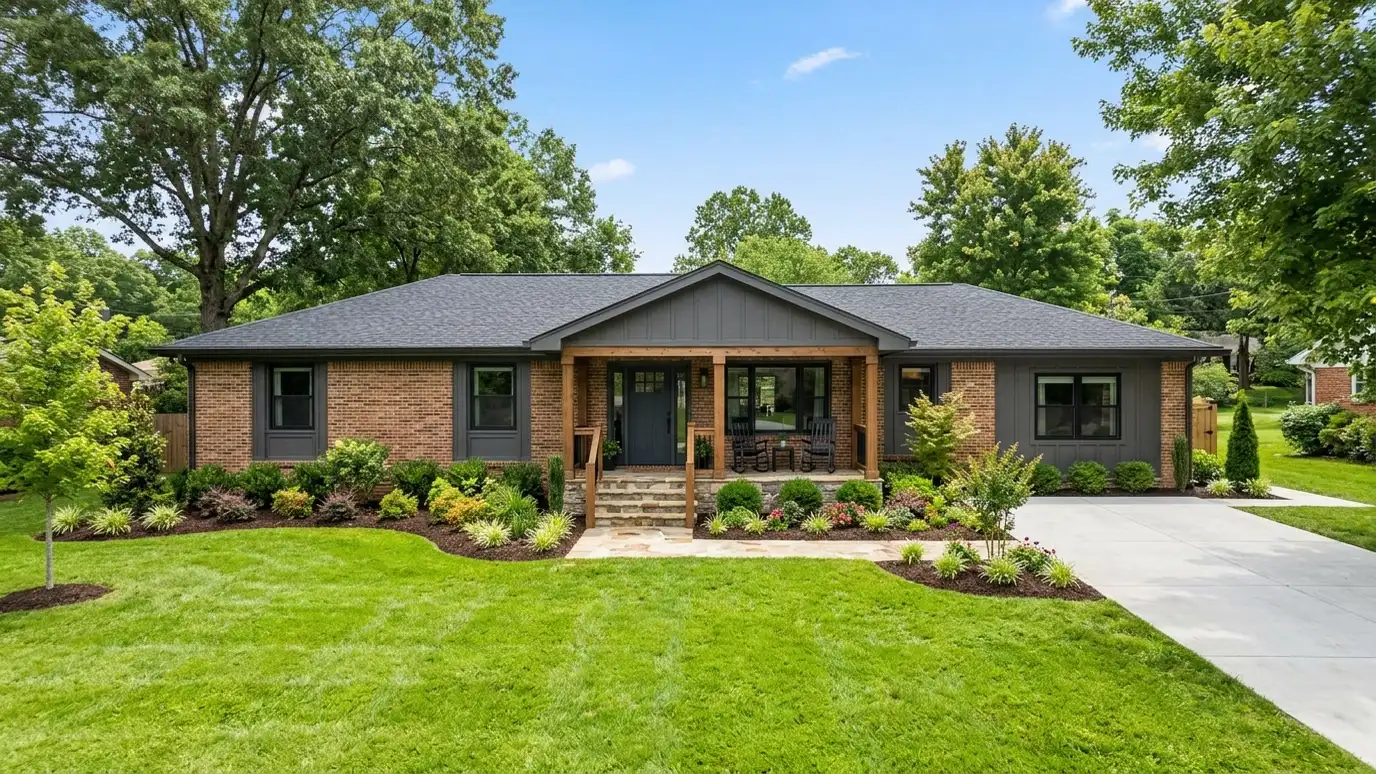 A modern farmhouse style home in Goodlettsville, Tennessee with a covered porch, large windows and warm natural light